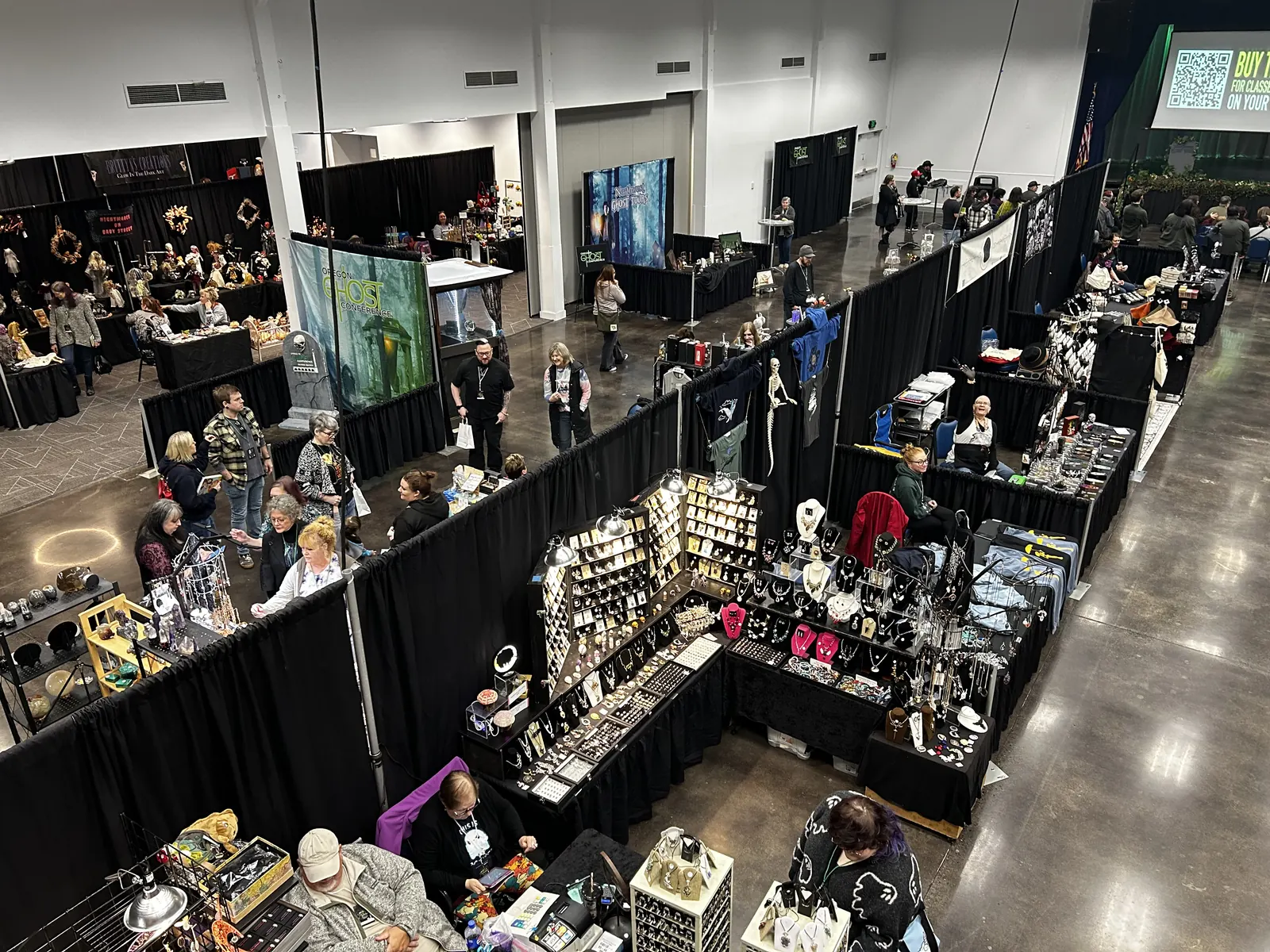Looking down over jewelry and crystal booths mid-rush in the vendor hall